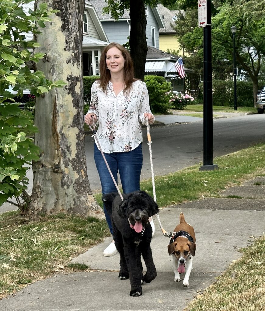 About Rachel Rachel Barnhart walking her rescue dogs, Penny and Prudy